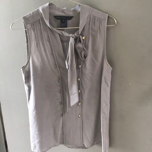 Sleeveless silk gray pull over  blouse.